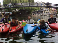 photo of a group kayaking at The Pirate Castle