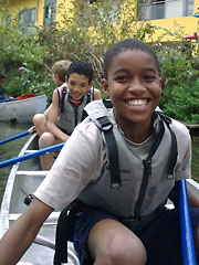 photo of a group canoeing at The Pirate Castle